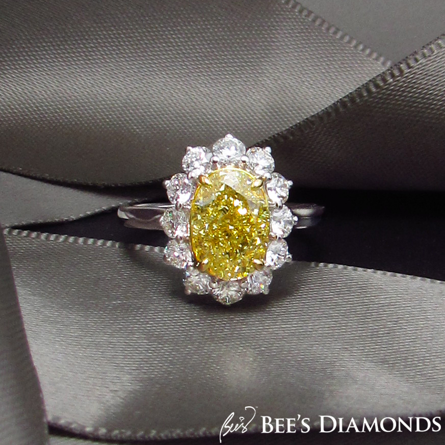 Oval, fancy yellow diamond ring, Sunflower shape engagement ring